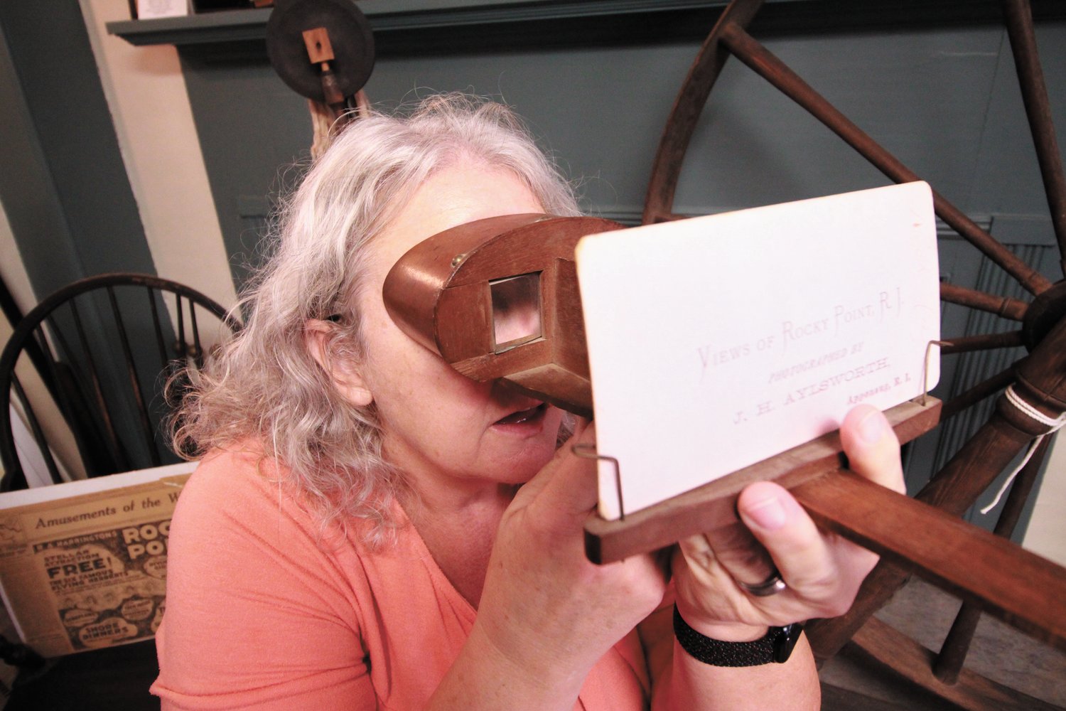IN 3D: Society board member Cindy Corkum uses a stereograph to view early photographs of the park.